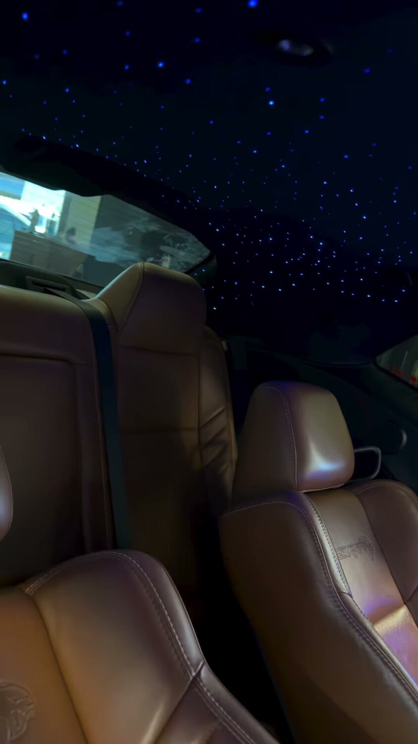 Cognac leather interior with a full fiber-optic starlight headliner